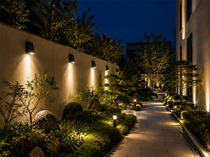 LED wall lights in landscape garden and pathway setting